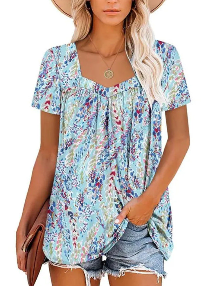 Dame afslappet blomster-top med V-hals og løs pasform Stilla