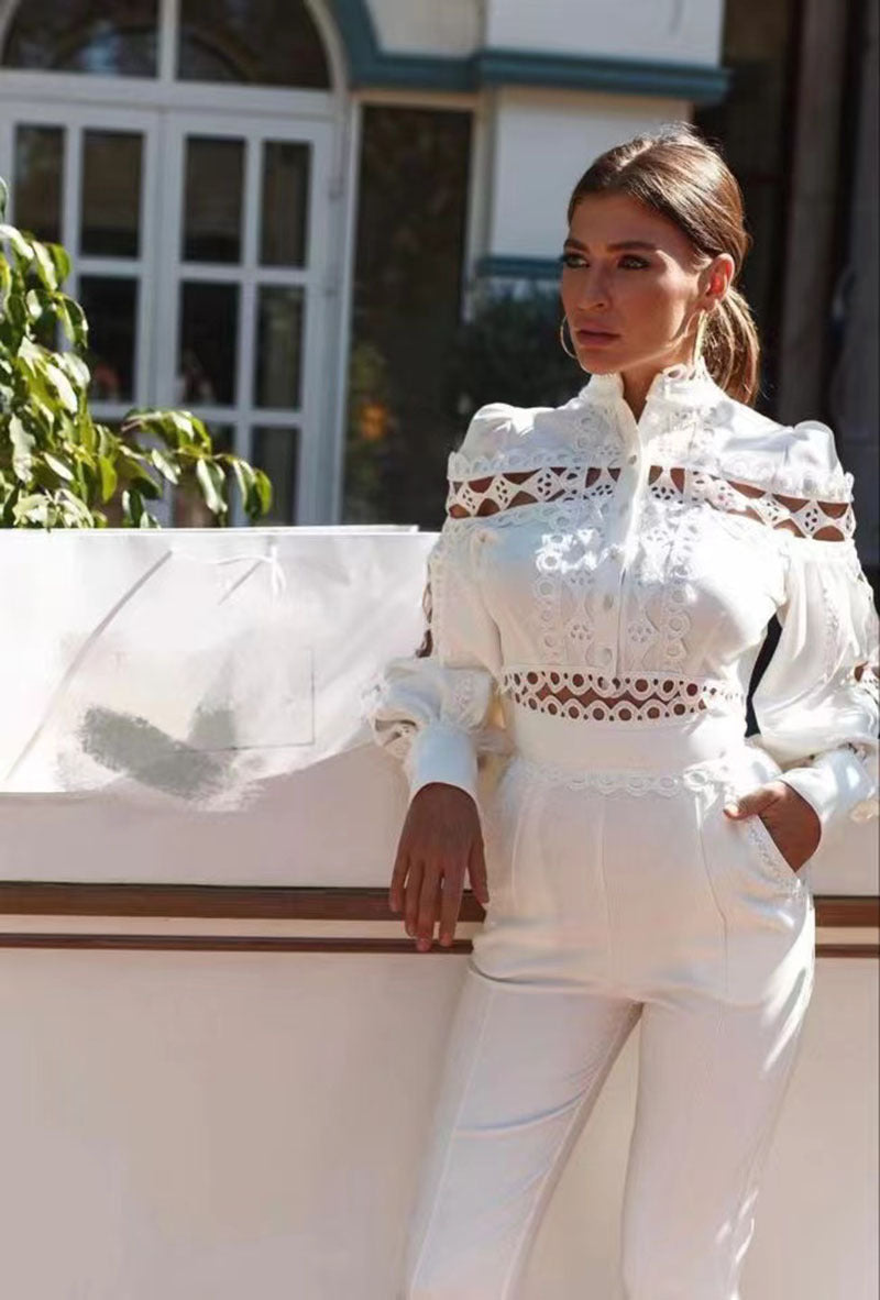 Dame jumpsuit med elegante cut-outs og voluminøse ærmer Stilla