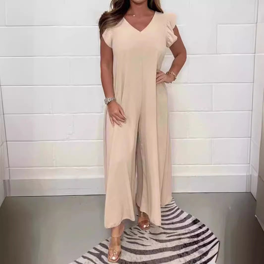Dame jumpsuit med voluminøse ben og elegant V-udskæring Stilla