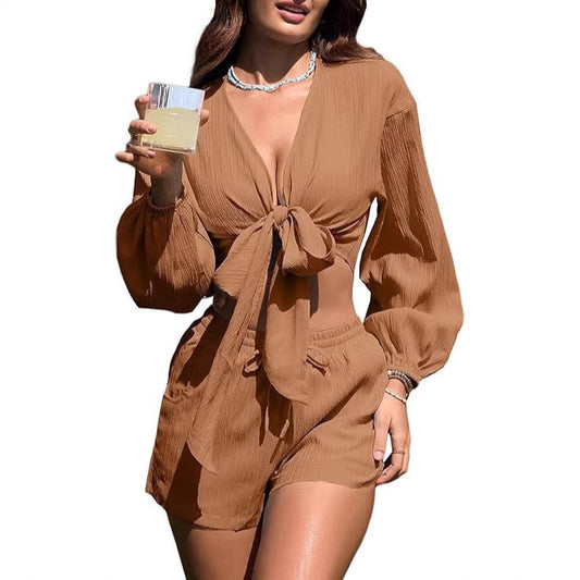 Dame Dæmpet Strandoverdel med voluminøse ærmer og flot bindebælte Stilla