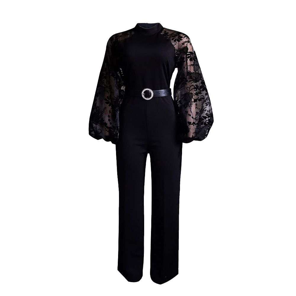 Dame jumpsuit med transparente puffærmer og taljerbar bælte Stilla