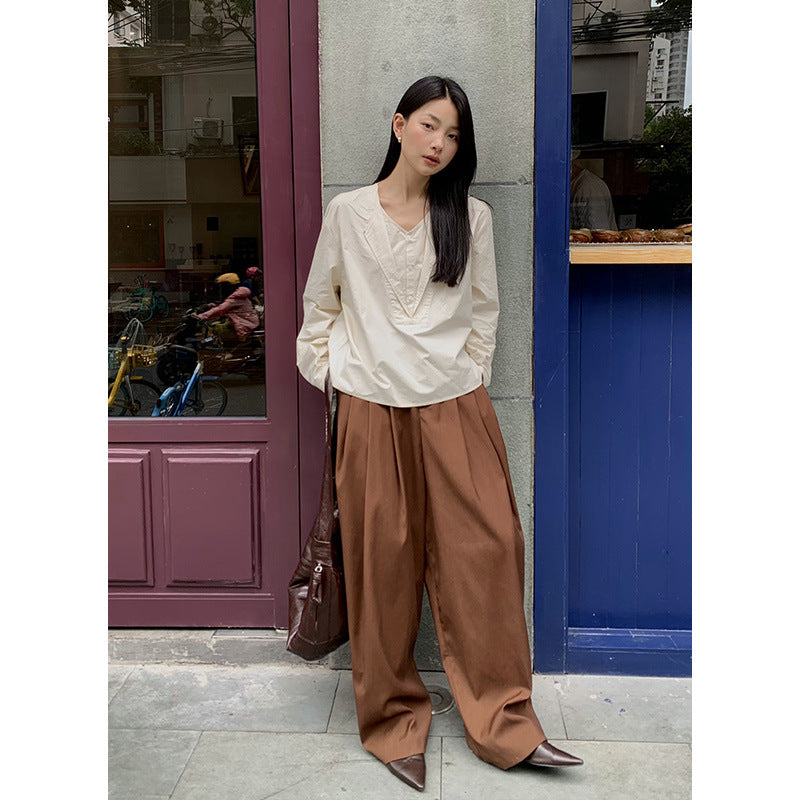 Dame afslappet langærmet skjorte med struktureret udskæring og knapdetaljer Stilla