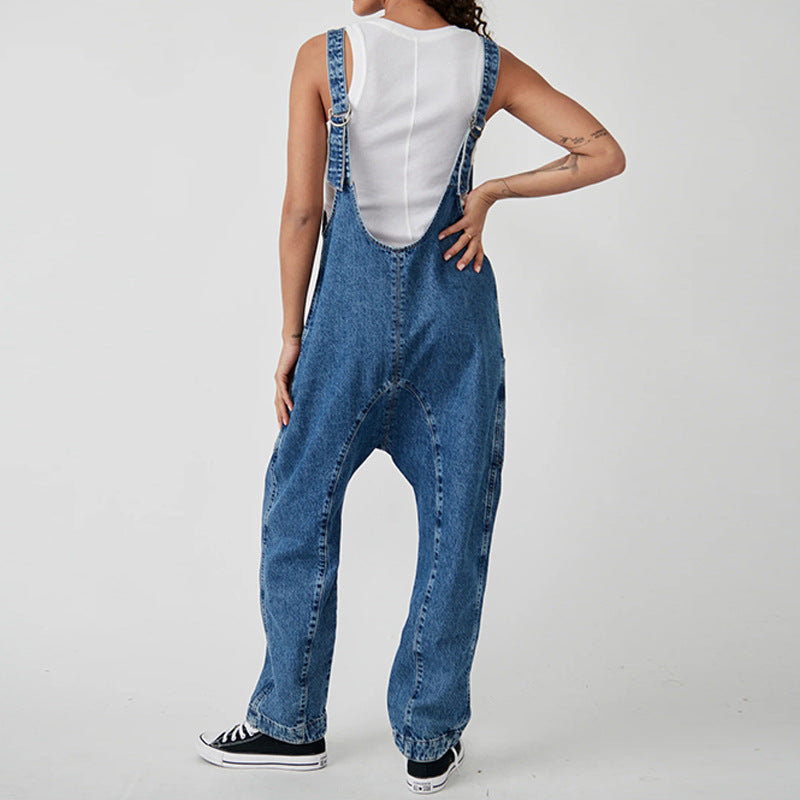 Dame afslappet jumpsuit med dyb udskæring og praktiske lommer Stilla