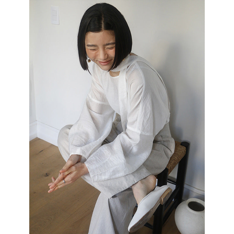 Dame afslappet indpakningsoverdel med elegant design og taljerbar bælte Stilla