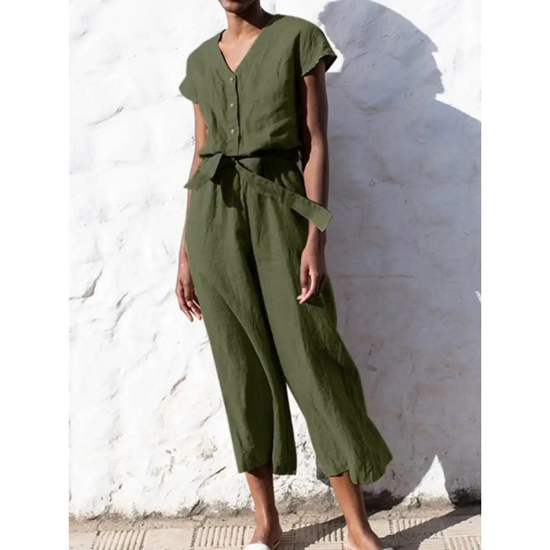 Dame let jumpsuit med taljebind og knapdetaljer Stilla