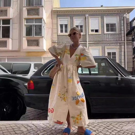 Dame afslappet maxikjole med blomstertryk og knapdetaljer Stilla