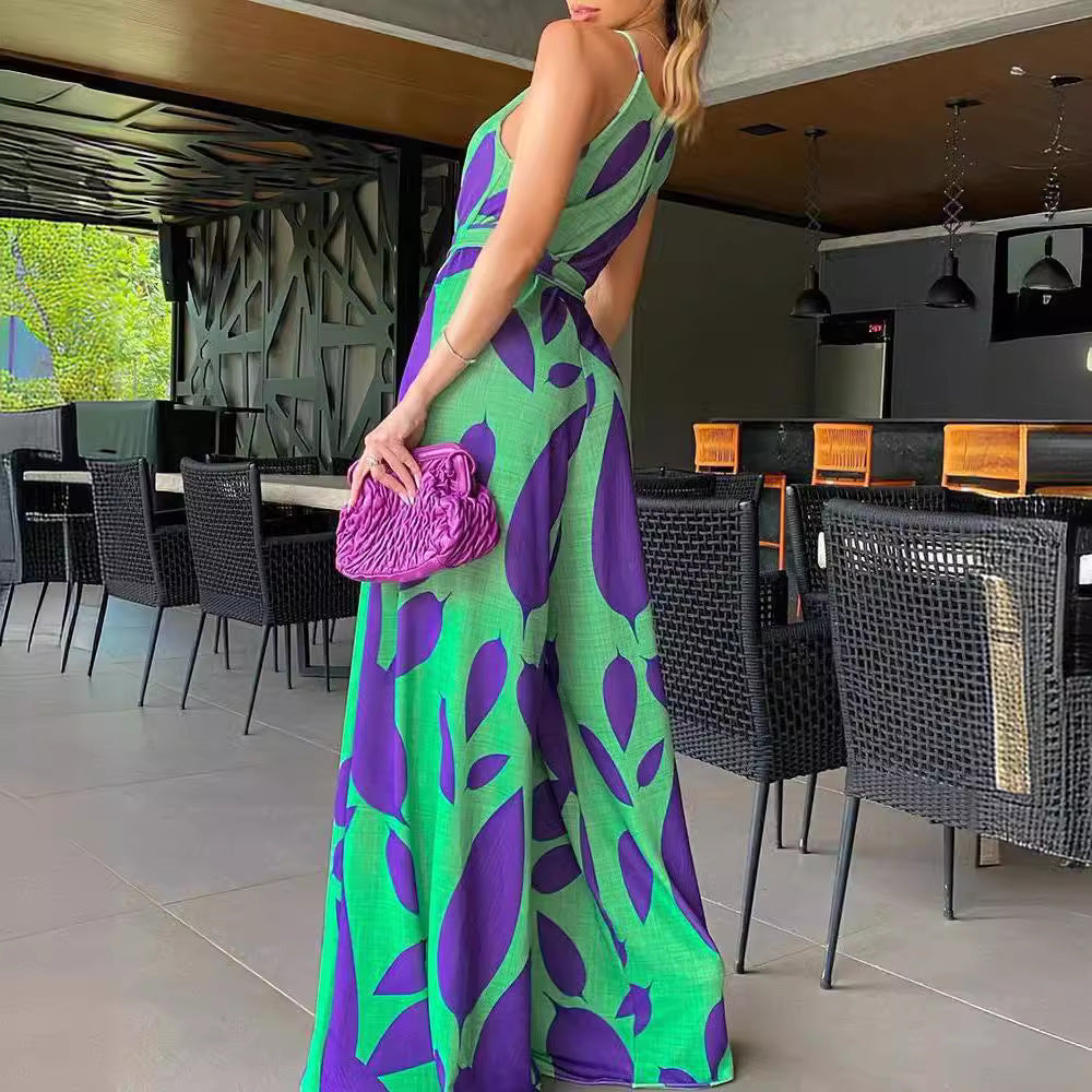 Dame jumpsuit med floral design og bred ben Stilla