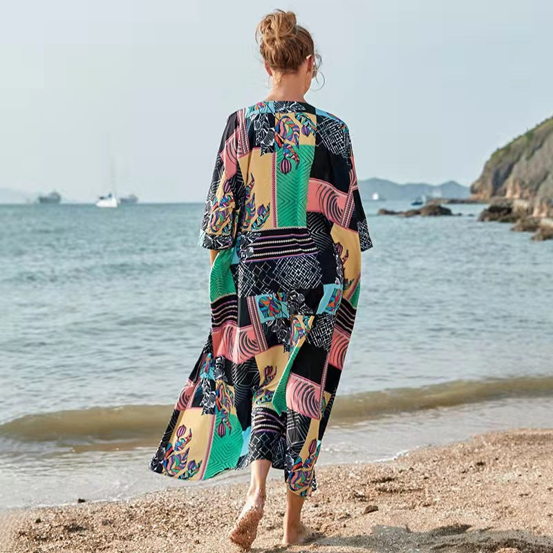 Dame eksklusiv strandkappe med farverigt mønster og elegant snit Stilla