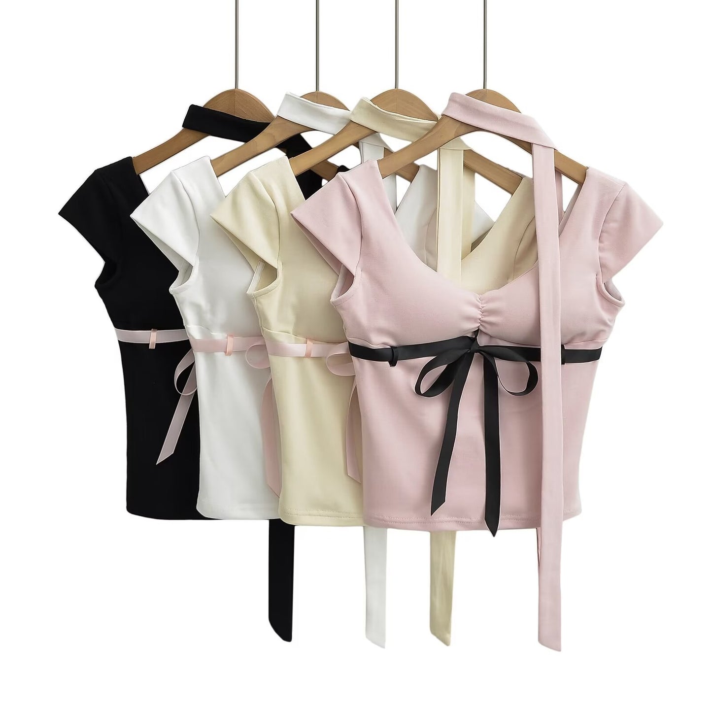 Dame Cut-out top med sødt båndaccent Stilla