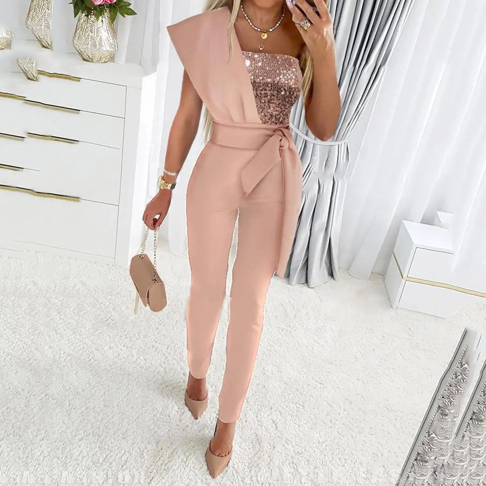 Dame elegant jumpsuit med asymmetrisk snit og glitrende overdel Stilla