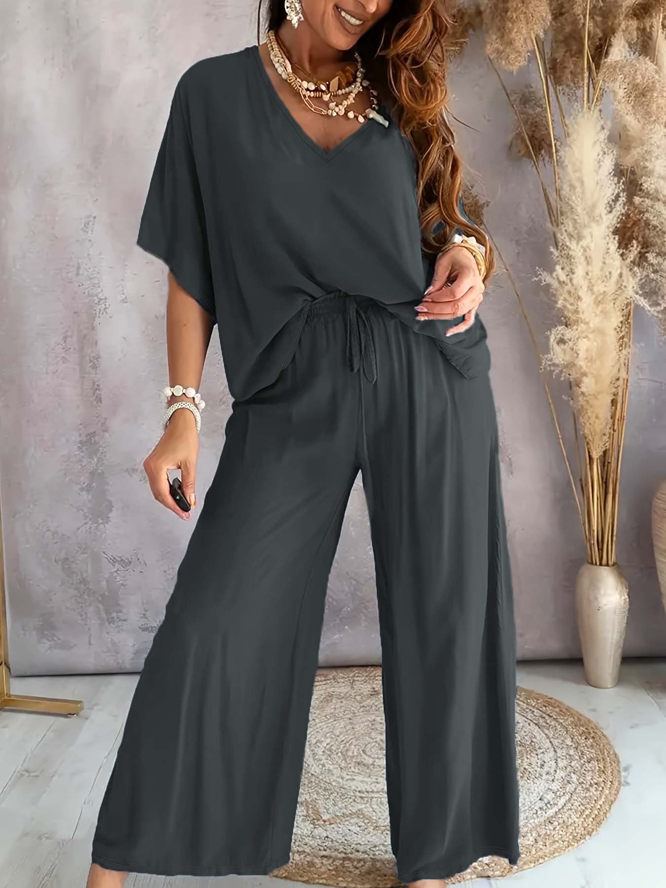 Dame afslappet jumpsuit med bred pasform og elastisk talje Stilla