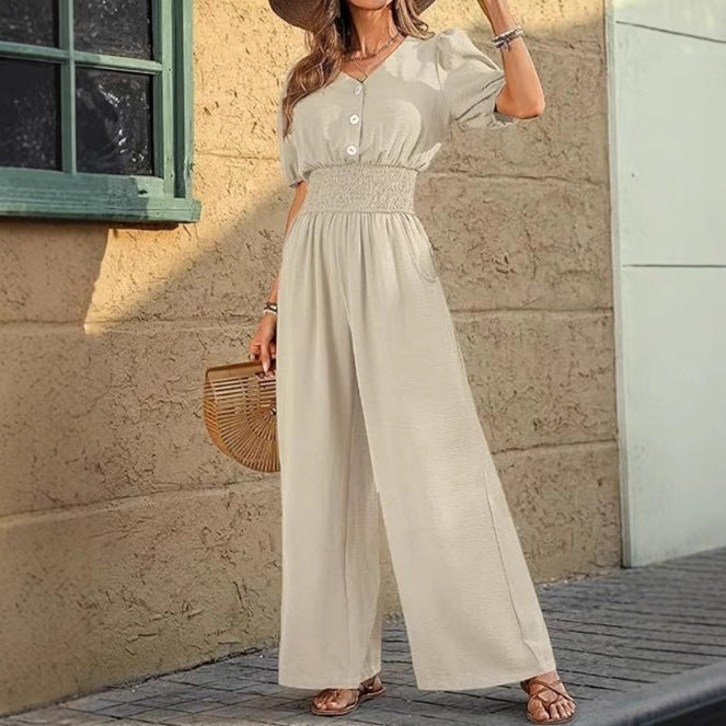 Dame jumpsuit med elastisk talje og knapdetalje Stilla