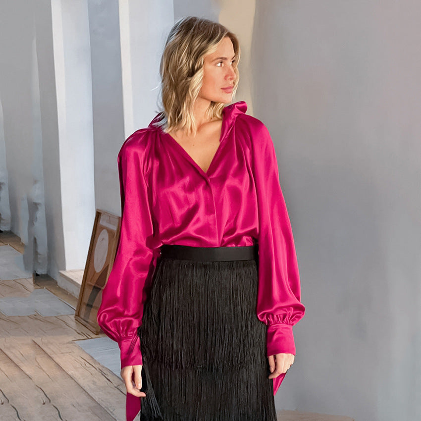 Dame elegant bluse med voluminøse ærmer og dyb v-hals Stilla