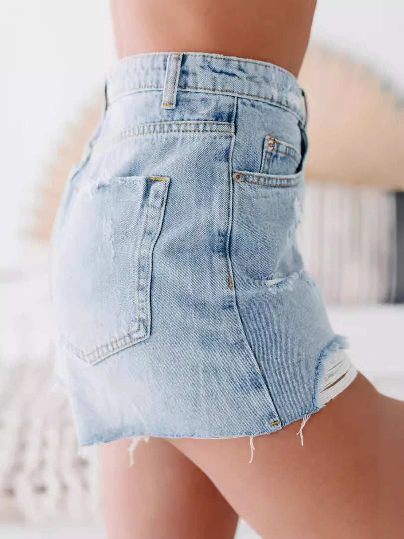 Dame Denim-shorts med høj talje og distressed-detaljer Stilla