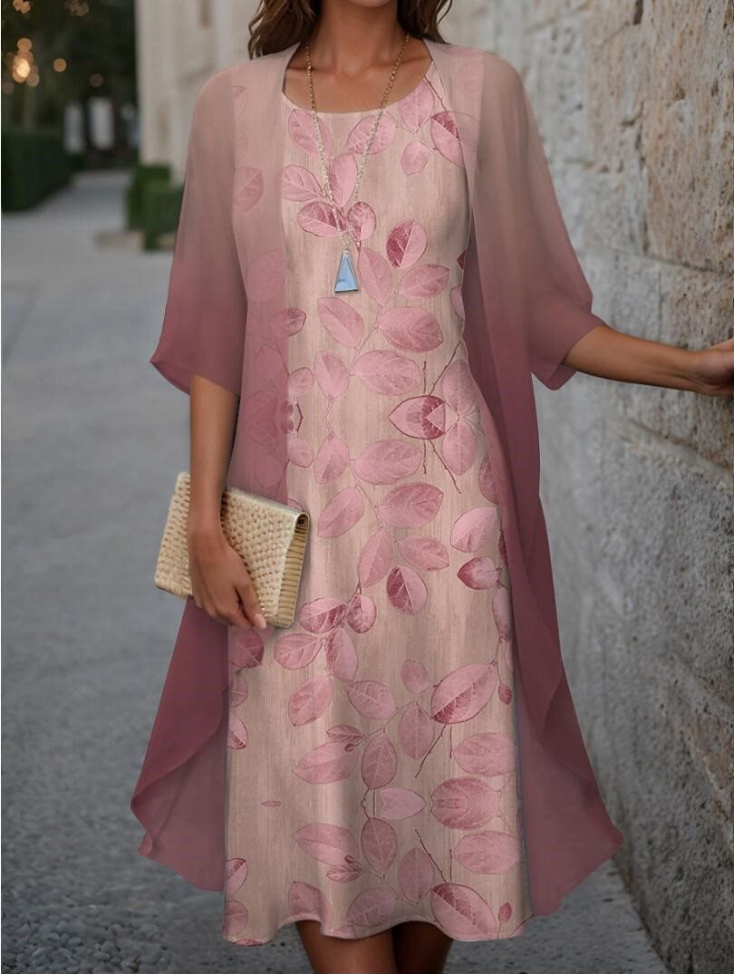 Dame elegant fritidskjole med asymmetrisk kant og floral design Stilla