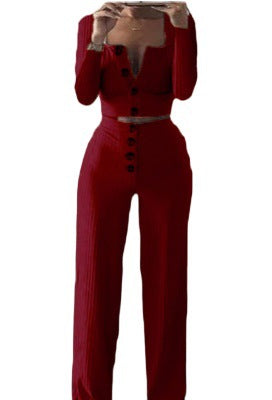 Dame jumpsuit med knapdetaljer og tætsiddende pasform Stilla