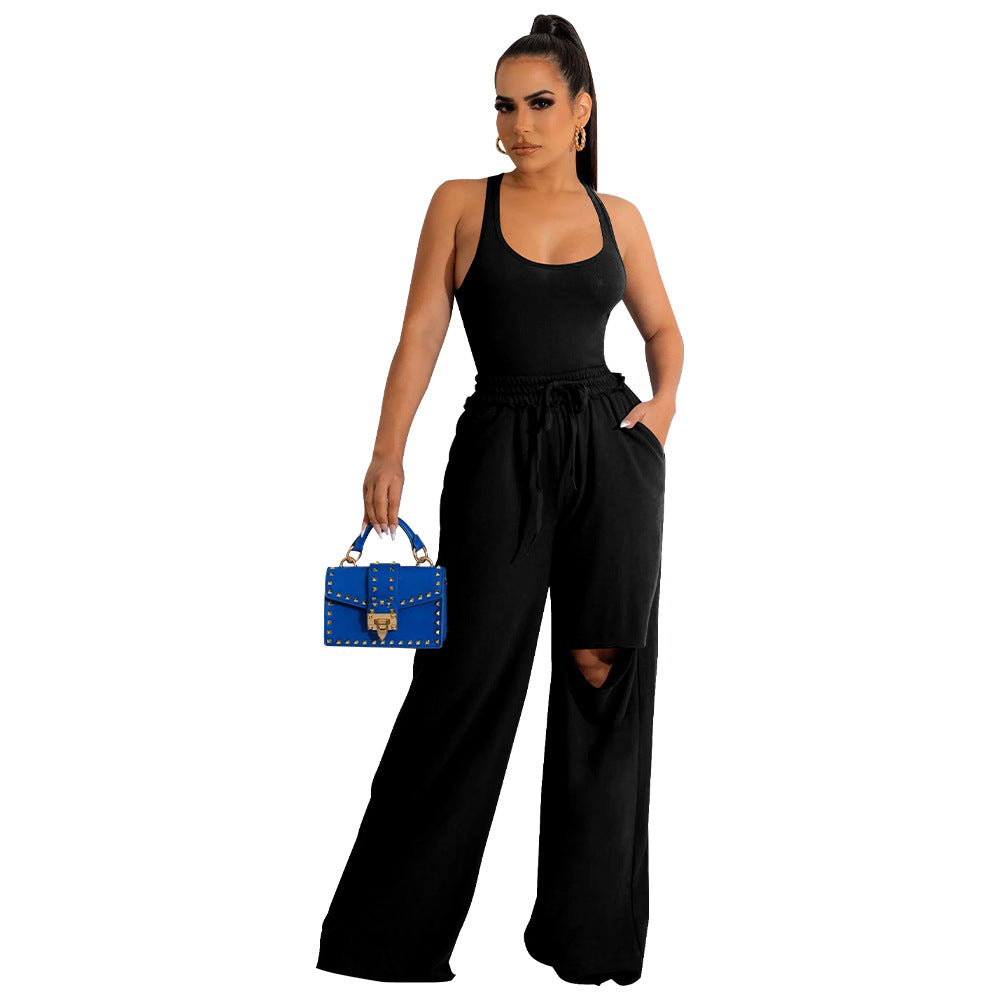 Dame Sporty Jumpsuit med høj talje og innovativ slidsdesign Stilla