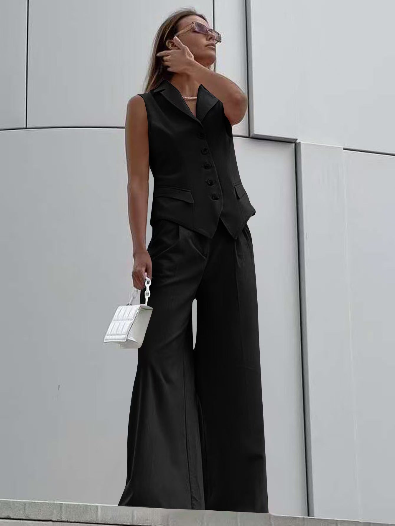 Dame jumpsuit med ærmeløs blazer og vide bukser Stilla