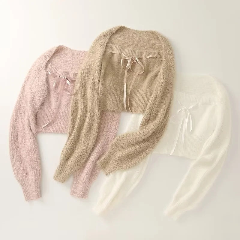 Dame cropped strikpullover med blød uldmix og elegante puffærmer Stilla