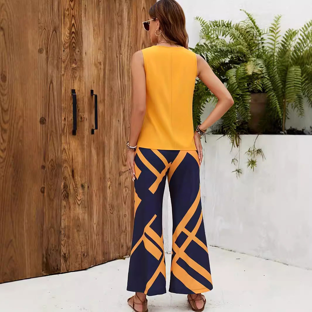 Dame afslappet strandoutfit med rummelig pasform og iøjnefaldende geometrisk mønster Stilla