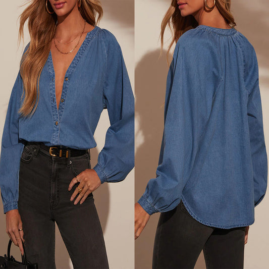Dame denim-bluse med dyb V-udskæring og elegante pufærmer Stilla