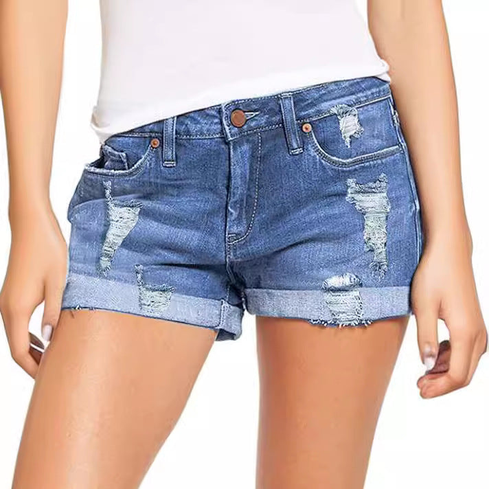 Dame Destroyed Denim-Shorts med omfoldet kant og trendy dekorationer Stilla