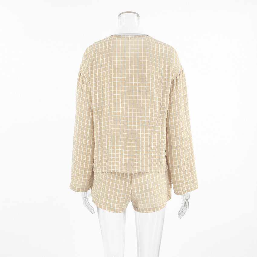 Dame afslappet pyjamasæt med ternet design og løs pasform Stilla