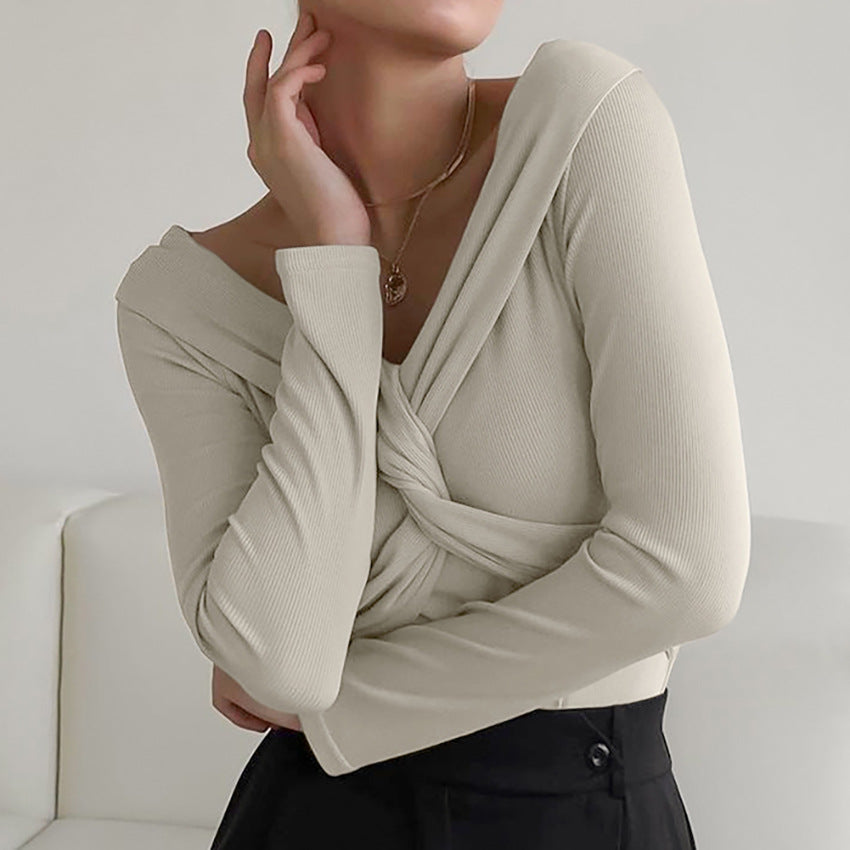 Dame bodysuit med stilfuldt omslag design og dyb V-udskæring Stilla