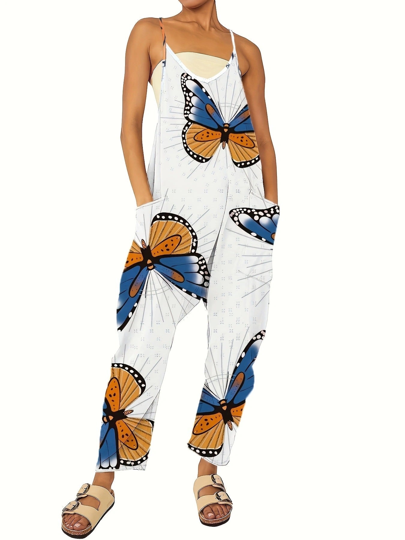 Dame jumpsuit med iøjnefaldende sommerfugledesign og praktiske lommer Stilla