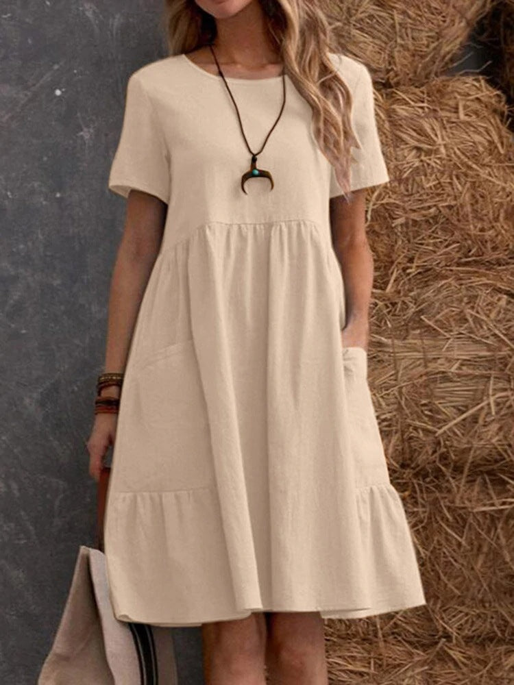 Dame afslappet kortærmet kjole med dobbelt flæse og praktiske lommer Stilla