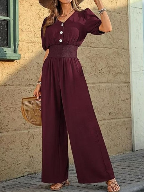 Dame jumpsuit med elastisk talje og knapdetalje Stilla