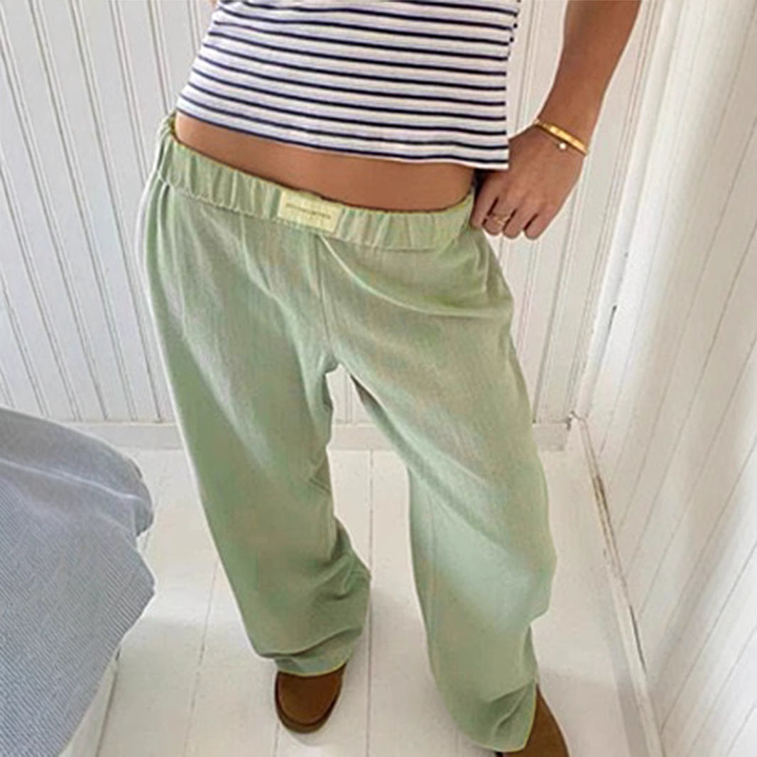 Dame afslappede Palazzo-bukser lavet af let, åndbart stof med elastisk talje Stilla