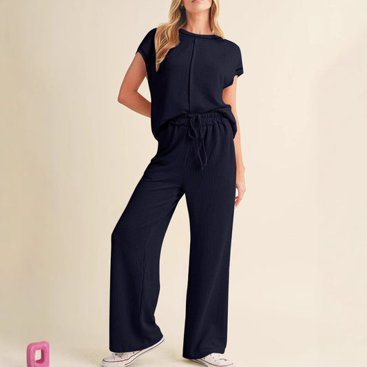 Dame afslappet jumpsuit med elegant ribdesign og bredt ben Stilla