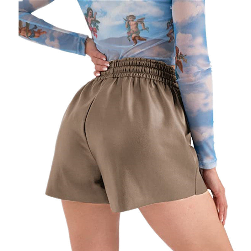 Dame afslappede shorts med elastisk talje og dekorative knapdetaljer Stilla