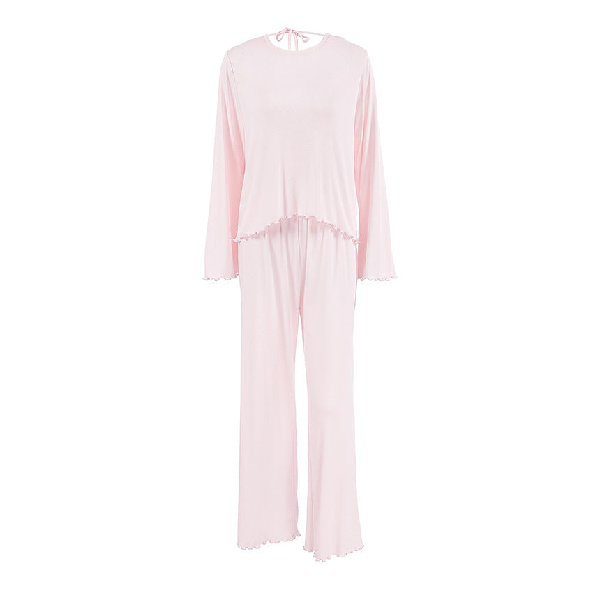 Dame afslappet pyjamasæt med flæsedetaljer og åndbart stof Stilla