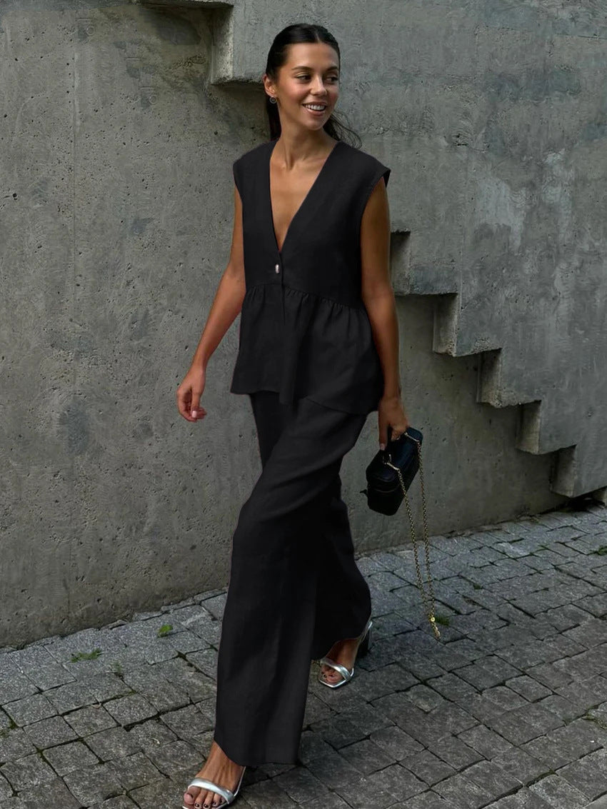 Dame luftig jumpsuit med elegant V-udskæring og taljering Stilla