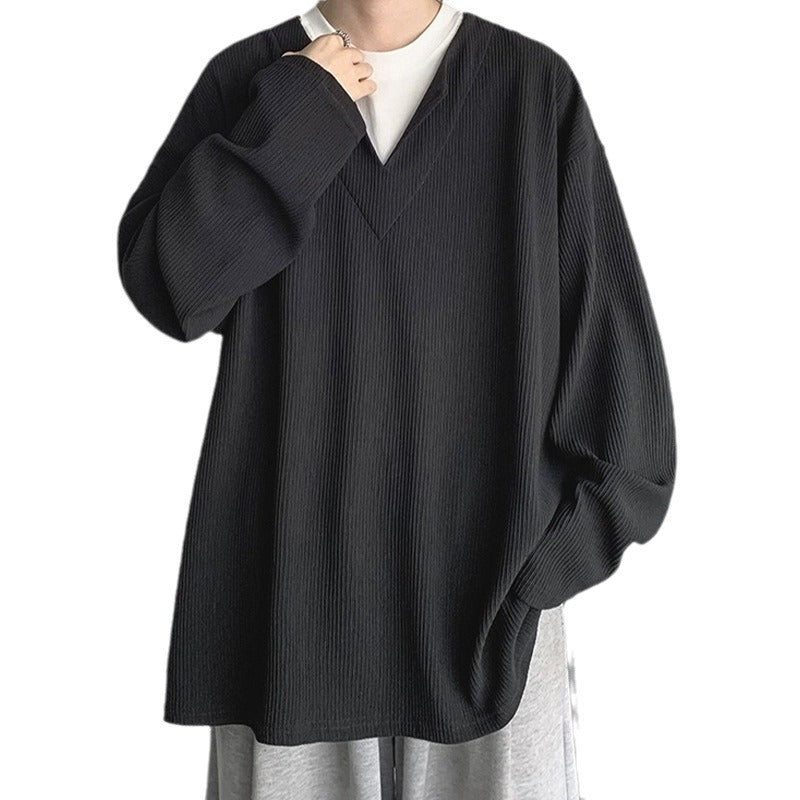 Dame afslappet oversized pullover med struktureret design og moderne V-udskæring Stilla