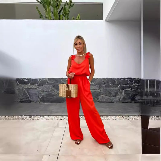 Dame løst skåret jumpsuit med floralt accent og elastisk talje Stilla