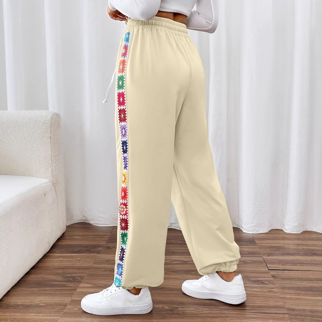 Dame joggingbukser med floral sidebånd Stilla