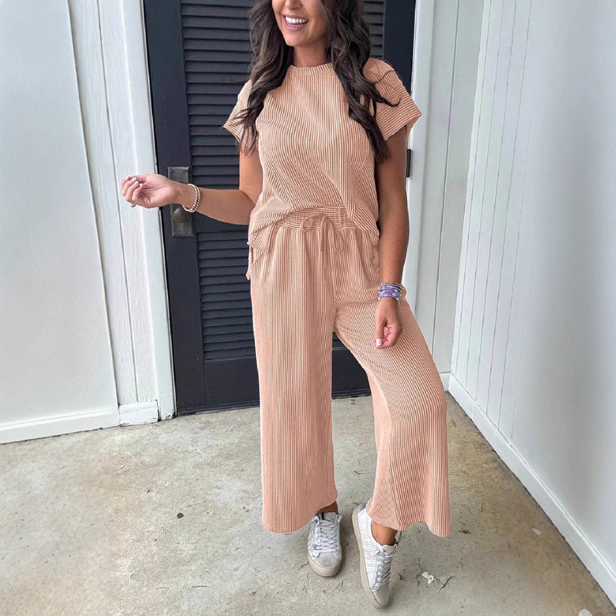 Dame afslappet strik-jumpsuit med brede ben og elastisk talje Stilla