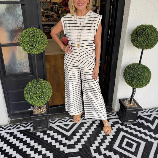 Dame stribet jumpsuit med bred ben og ærmeløst design Stilla