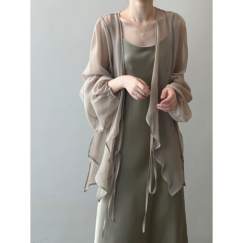 Dame elegant gennemsigtig bluse med dyb V-hals og bindebånd Stilla