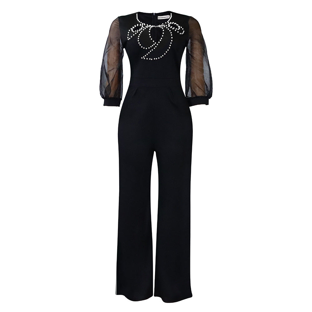 Dame Elegante Jumpsuit med gennemsigtige ærmer og smykker detaljer Stilla