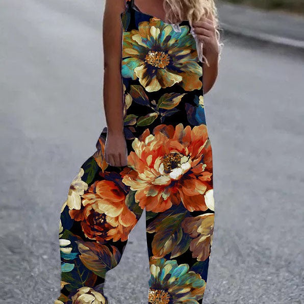 Dame luftig jumpsuit med farverigt blomstermønster og justerbare stropper Stilla