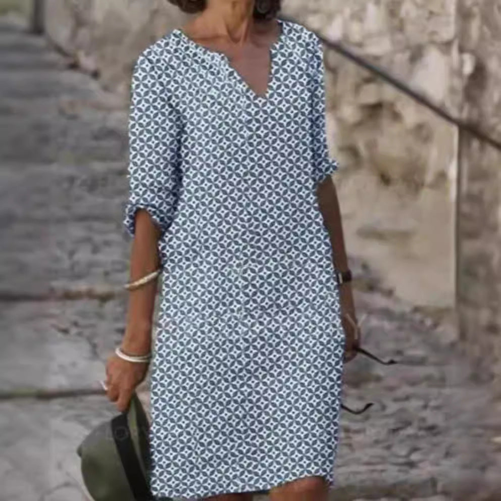 Dame afslappet skjortekjole med blomstermotiv og praktiske sidelommer Stilla