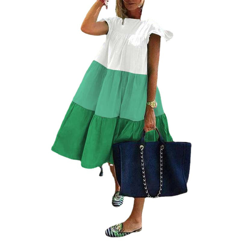 Dame afslappet langærmet kjole med flæse og asymmetrisk snit Stilla