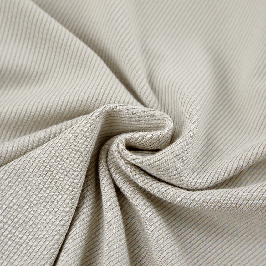 Dame bodysuit med stilfuldt omslag design og dyb V-udskæring Stilla