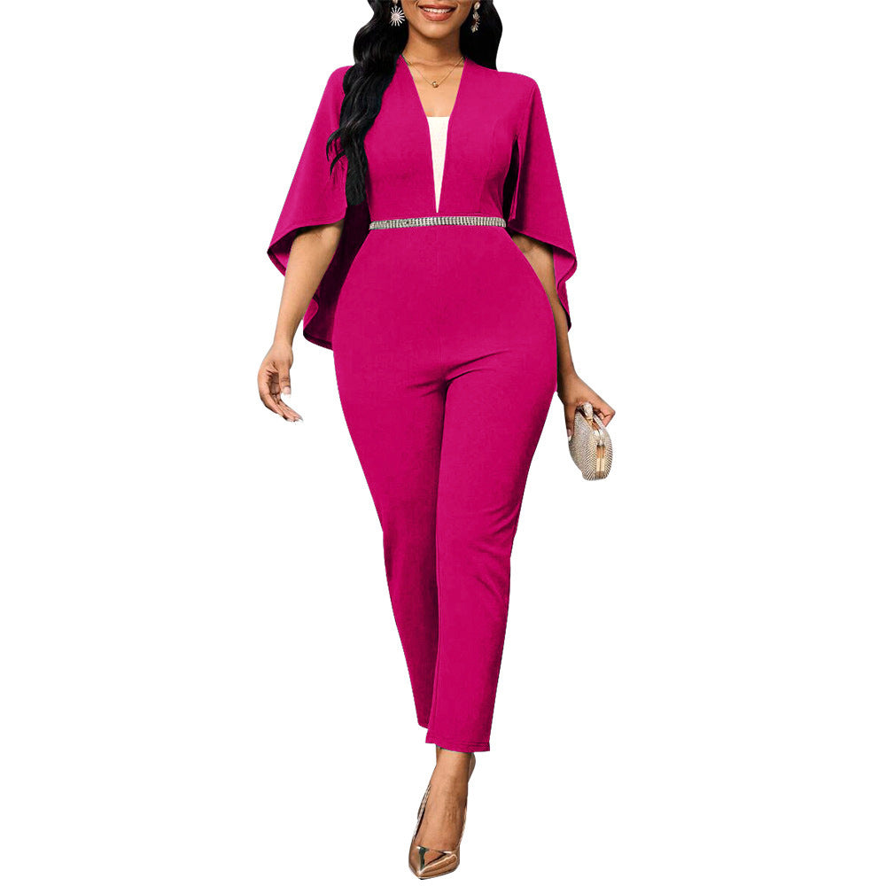 Dame Jumpsuit med elegant Cape-design og taljerende aksenter Stilla