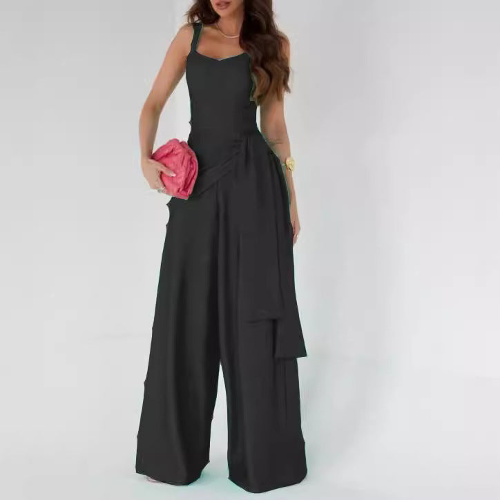 Dame bredt jumpsuit med elegante draperinger og stropper Stilla