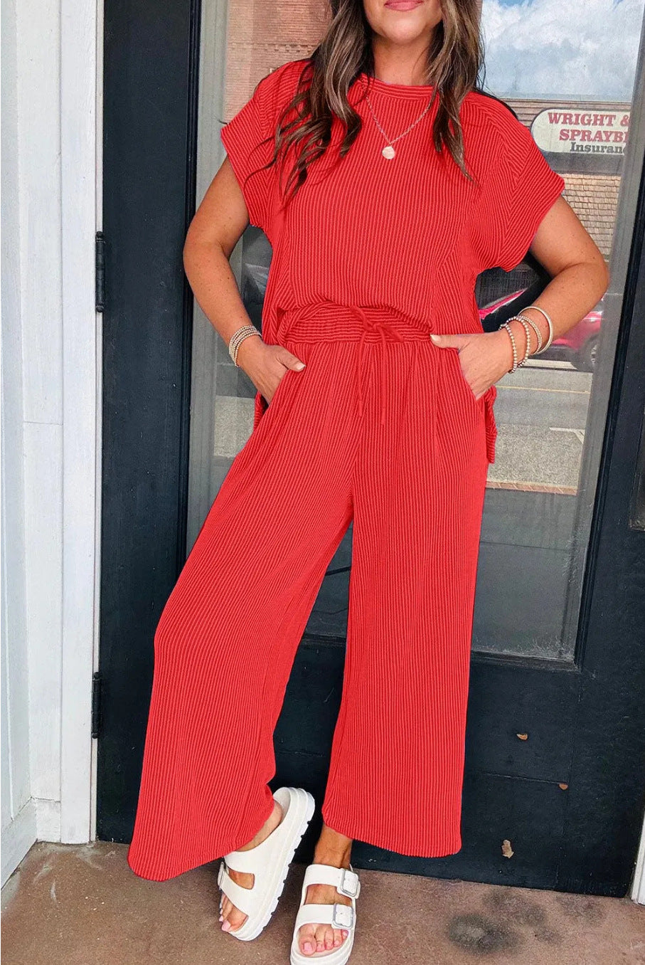 Dame afslappet strik-jumpsuit med brede ben og elastisk talje Stilla